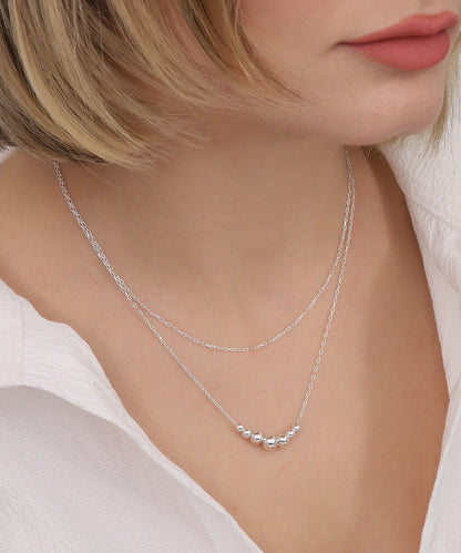 Çift Zincirli Top Detaylı Gümüş Kolye